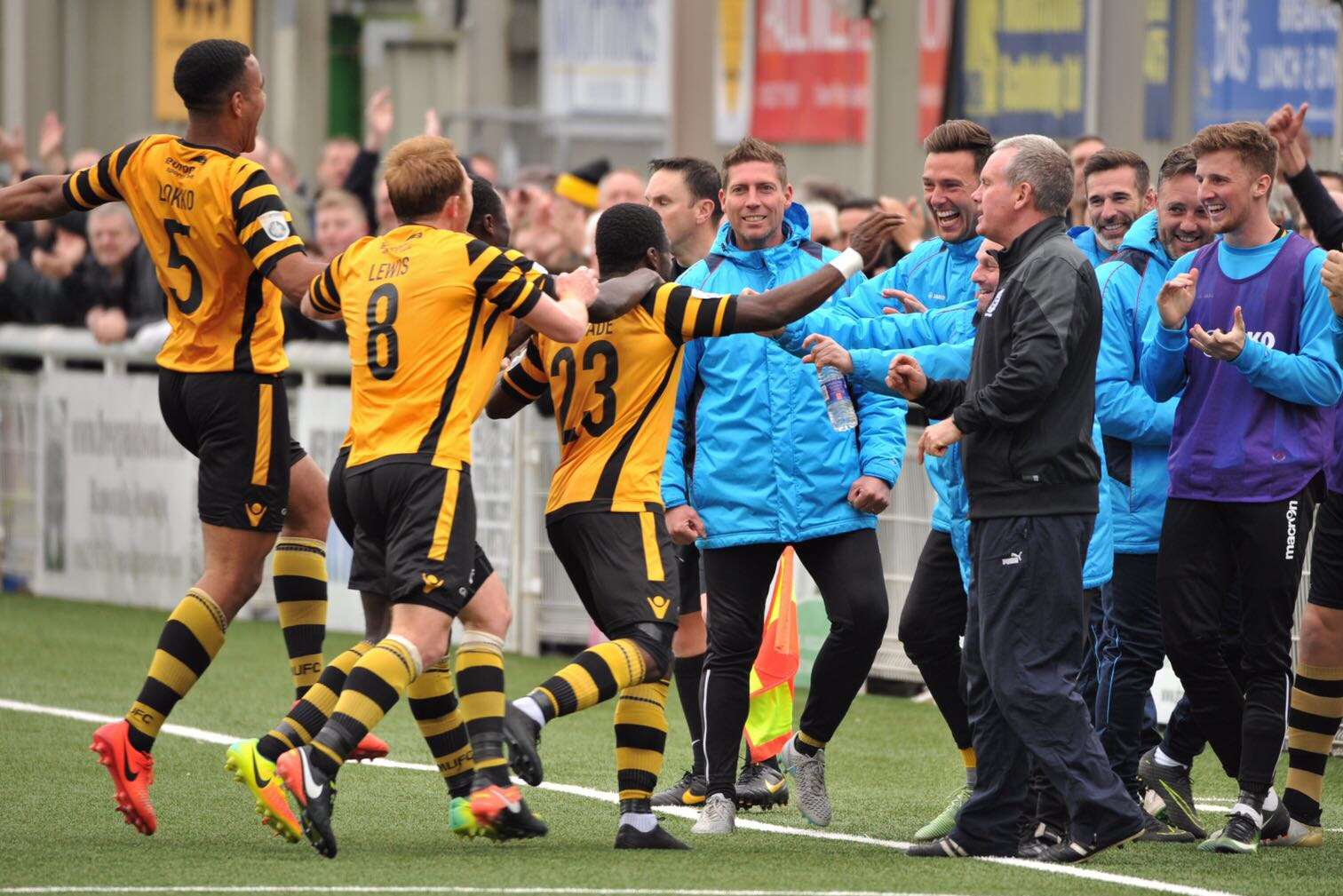 Absolute scenes as Yemi Odubade runs to the Maidstone bench to celebrate Picture: Steve Terrell