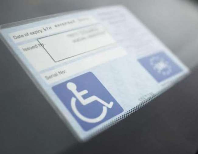 The Blue Badge gives disabled people the privilege of parking on yellow lines or in time-restricted zones without penalty
