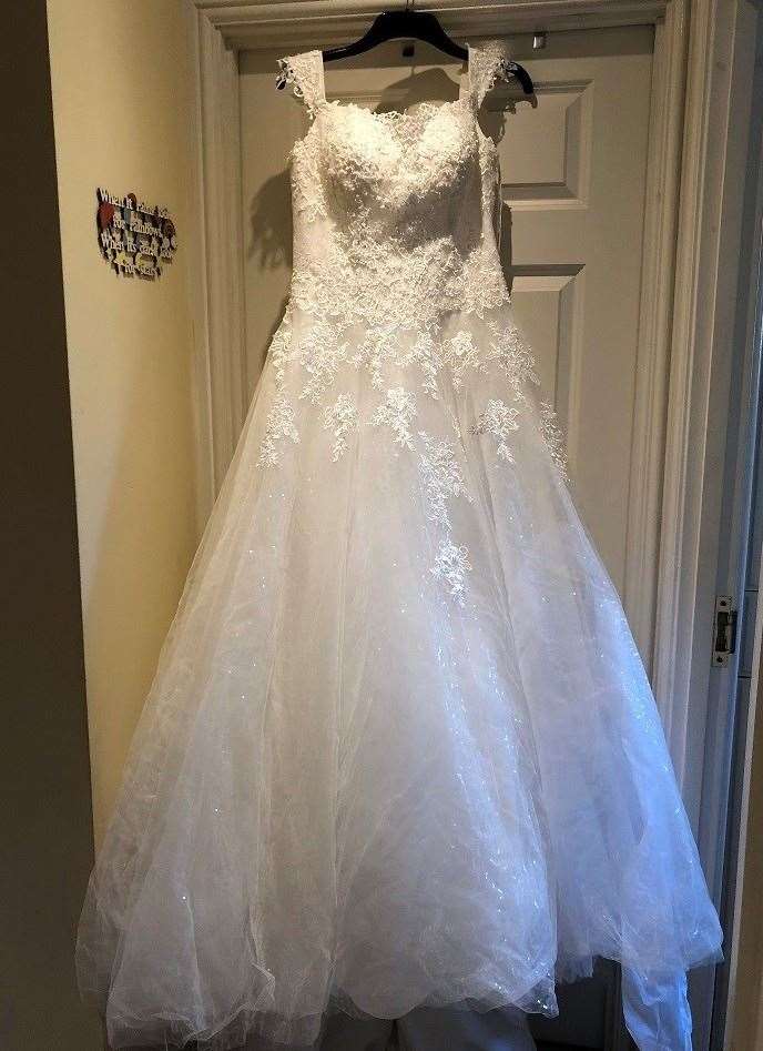The dress which was given to Michelle Drew at the dry cleaners, but actually belonged to Nicola Links Photo: Michelle Drew