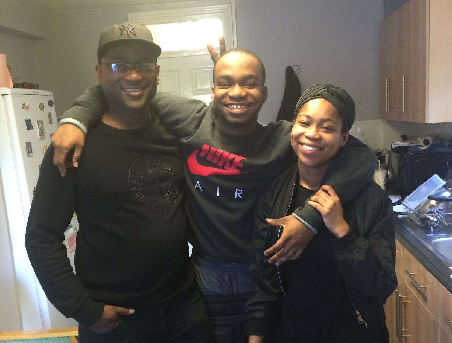 Andre Bent (centre), with father Michael Bent and sister Michaela Bent