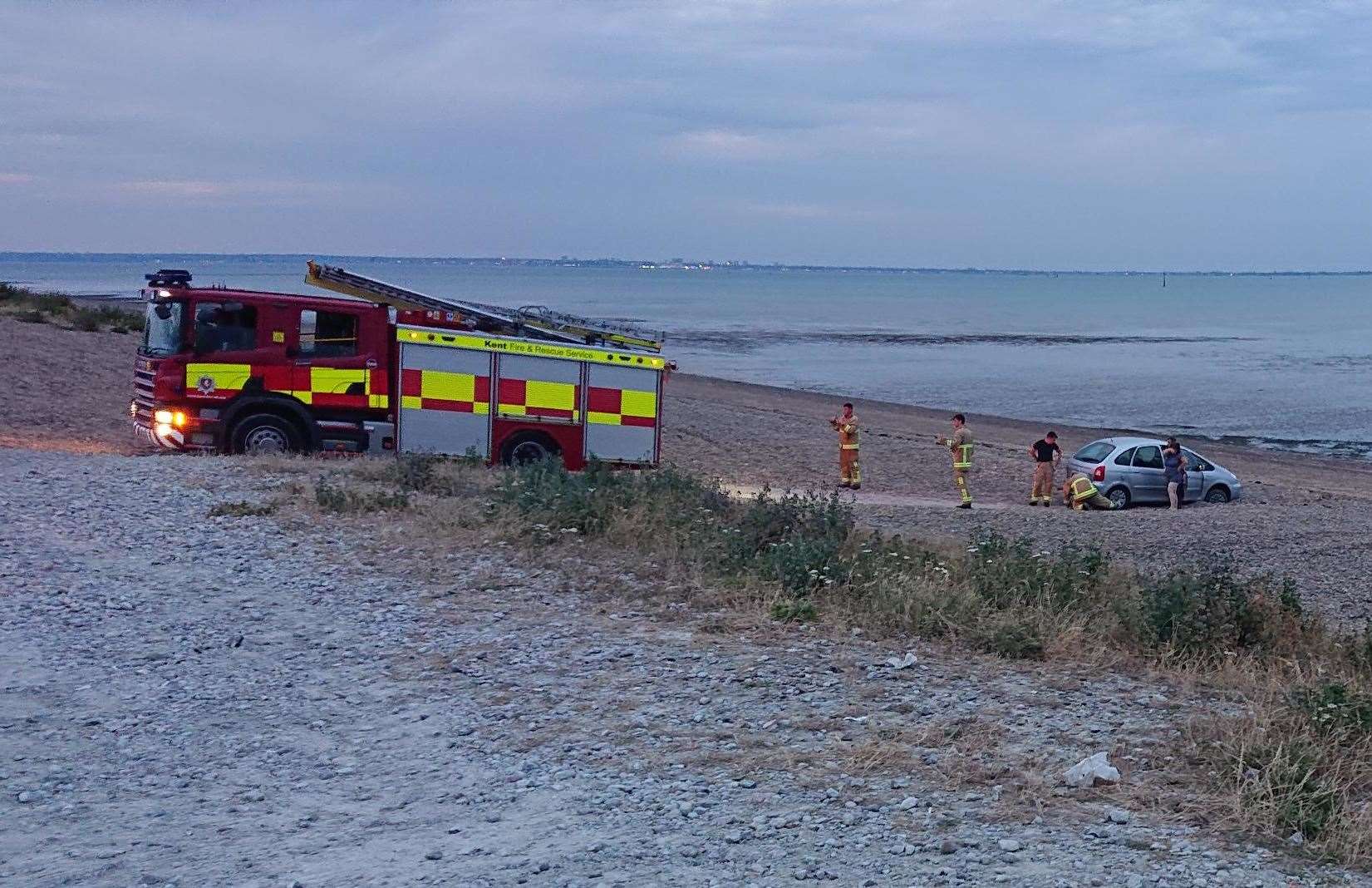 Emergency crews were called in to help the trapped driver and passengers. Picture: Stuart H