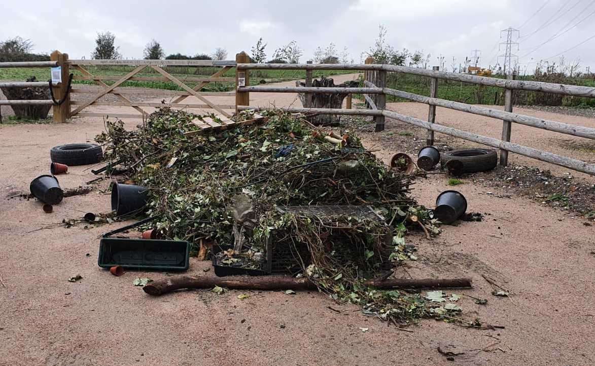 Garden waste dumped at the entrance to Riverview natural burial ground at Lower Halstow