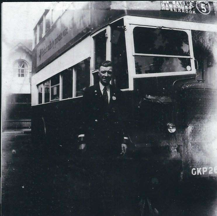 Keith Webb beside a Daimler wartime utility bus