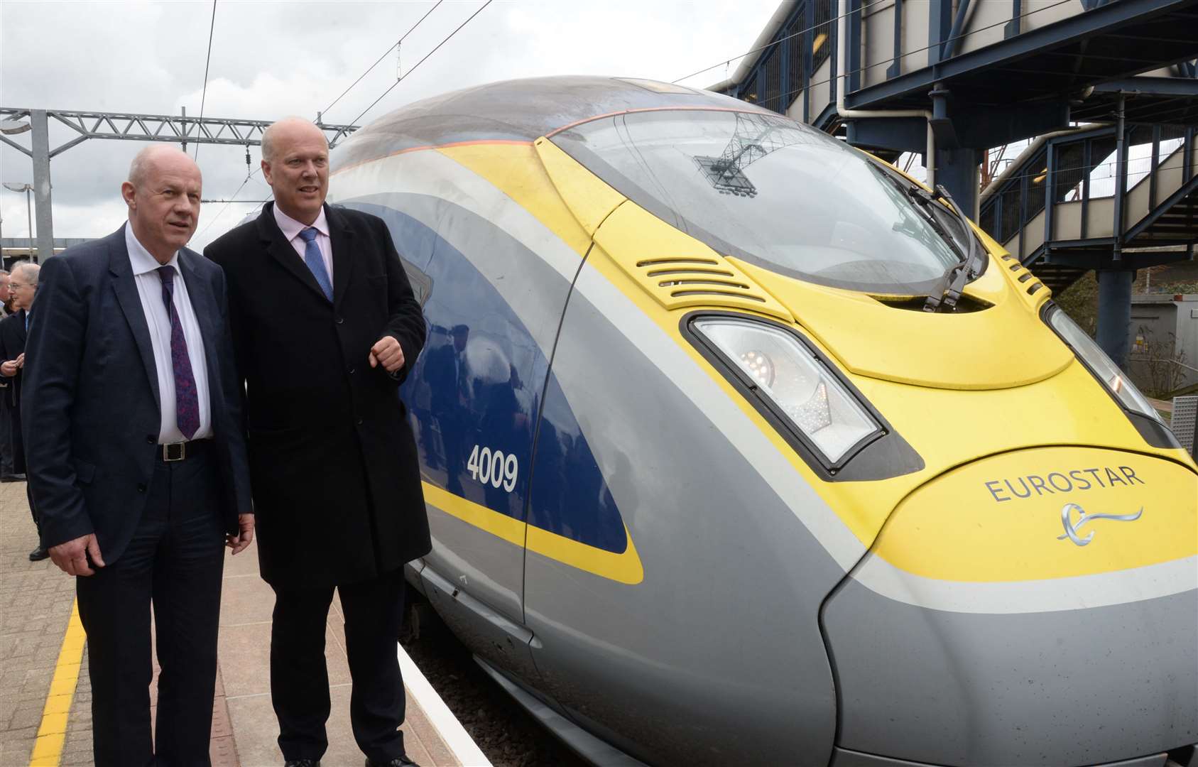 Damien Green MP and Secretary of State for Transport Chris Grayling inspect one of the new e320 class trains at Ashford International station in April 2018