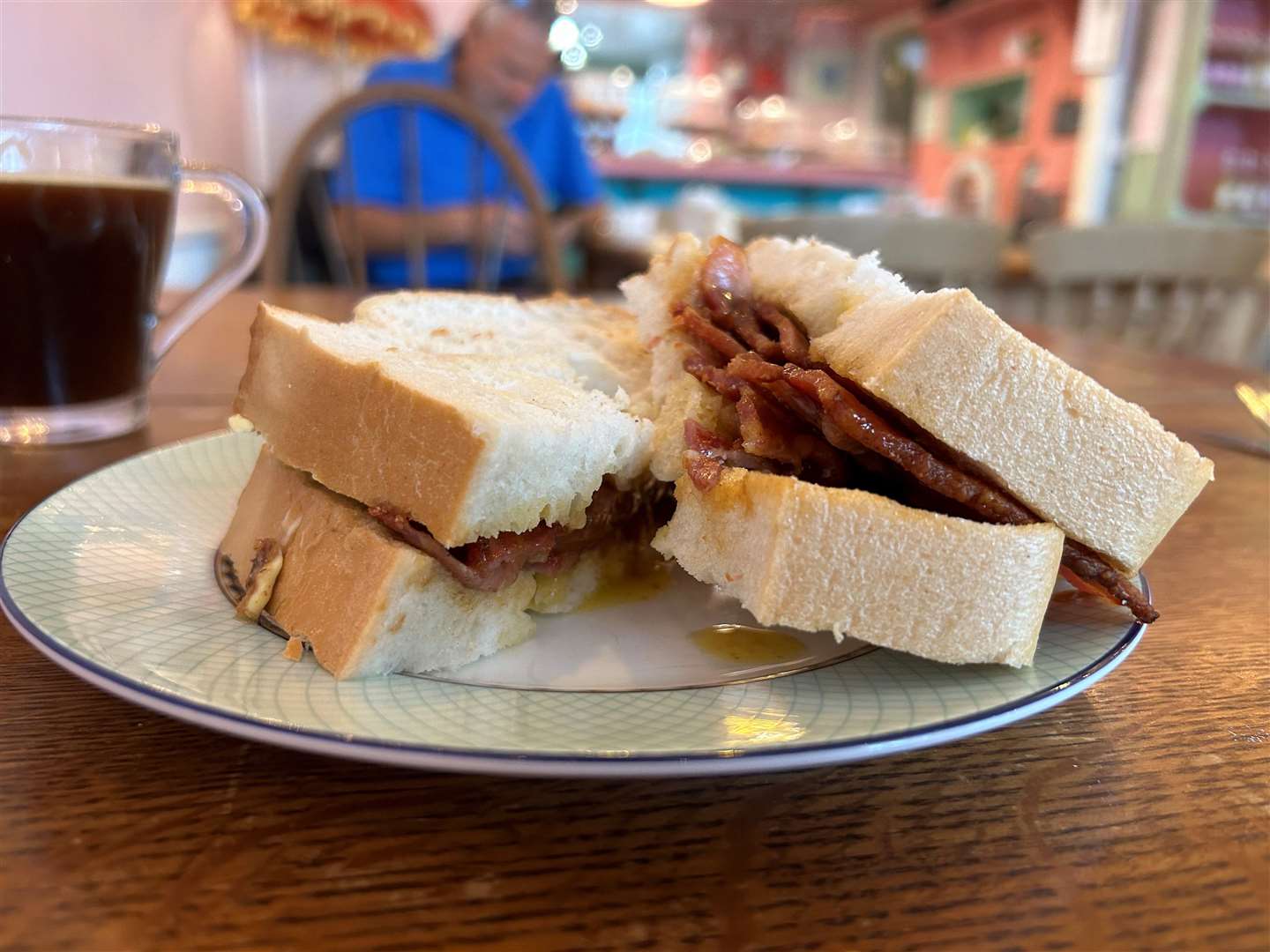 Butter dripping out of the bacon sandwich at The Dog House in Sandgate