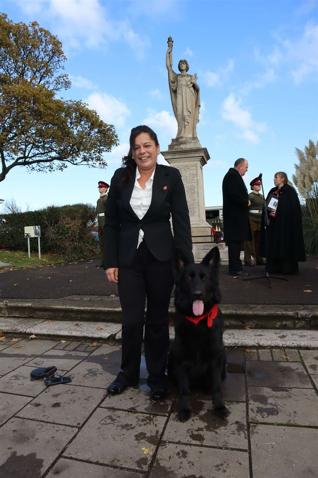 Jenna Bahara and her Gerrman Shepherd Fate with her poppy collar at the Remembrance Sunday service at Sheerness (21306154)