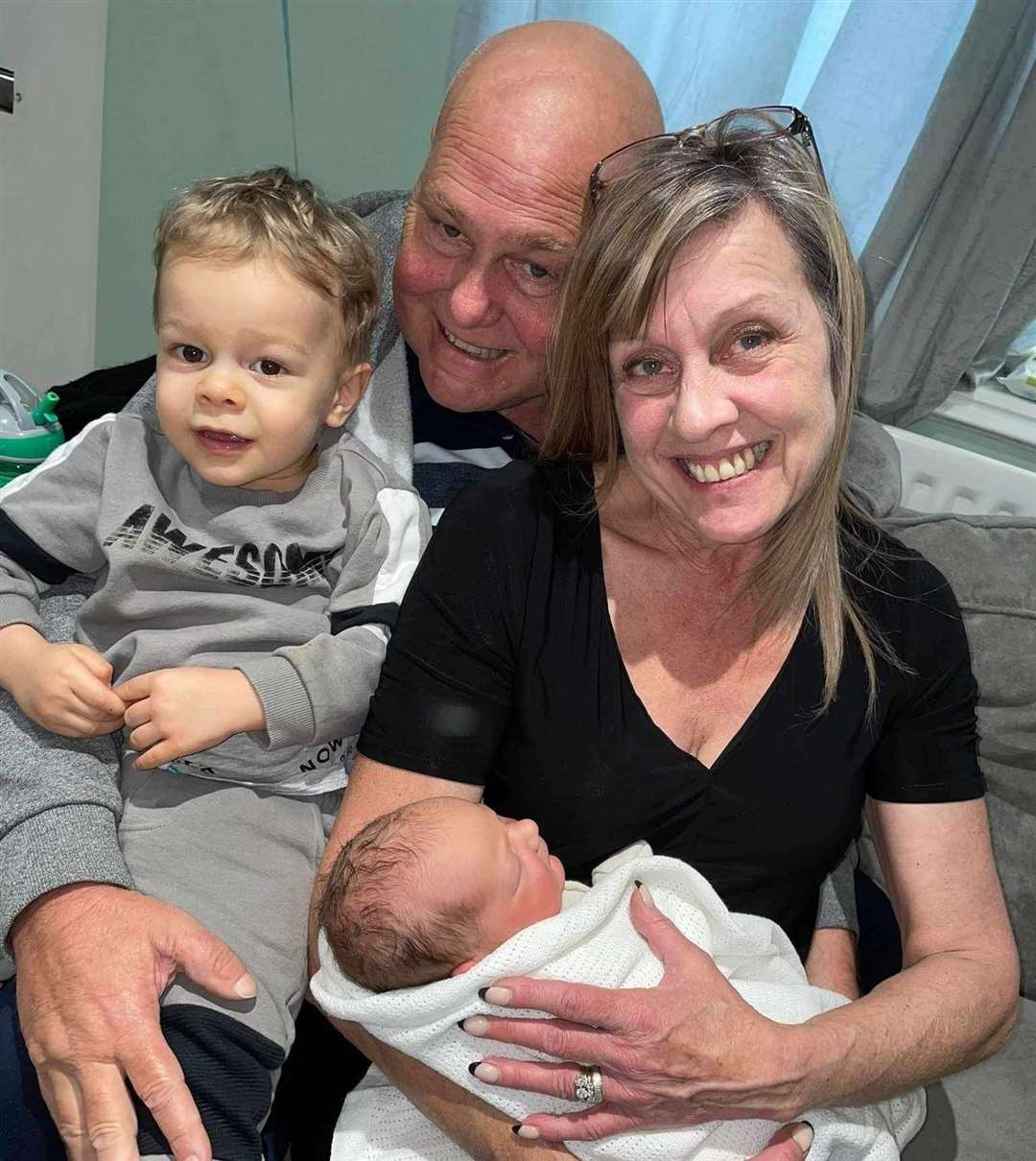 Neil and Jacqui pictured with their grandchildren, Leo and Archie. Picture: Jacqui Moxom