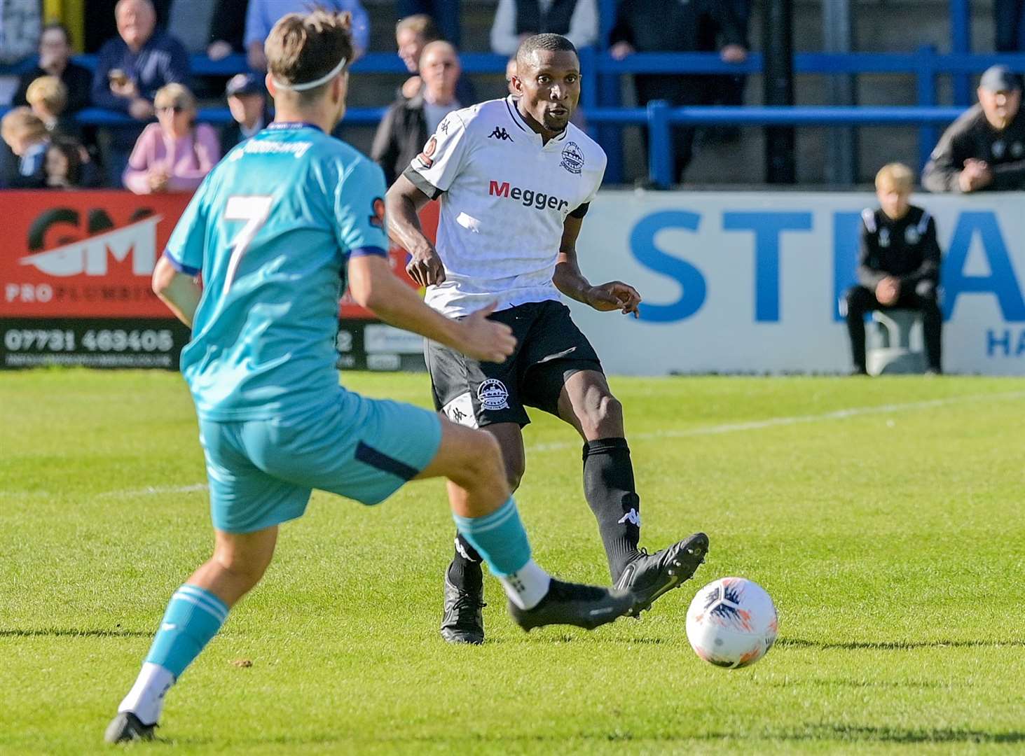 Dover's Tyrone Sterling passes the ball forward as he marks his 35th birthday with a 3-1 win over Braintree. Picture: Stuart Brock