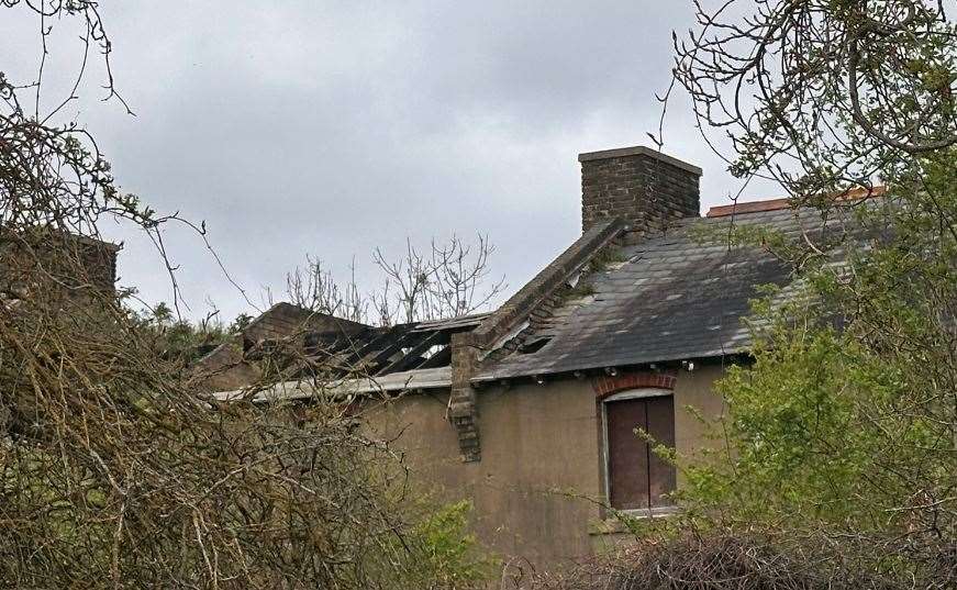 The damage caused to the roof after a fire at a derelict property on Lodge Hill Lane