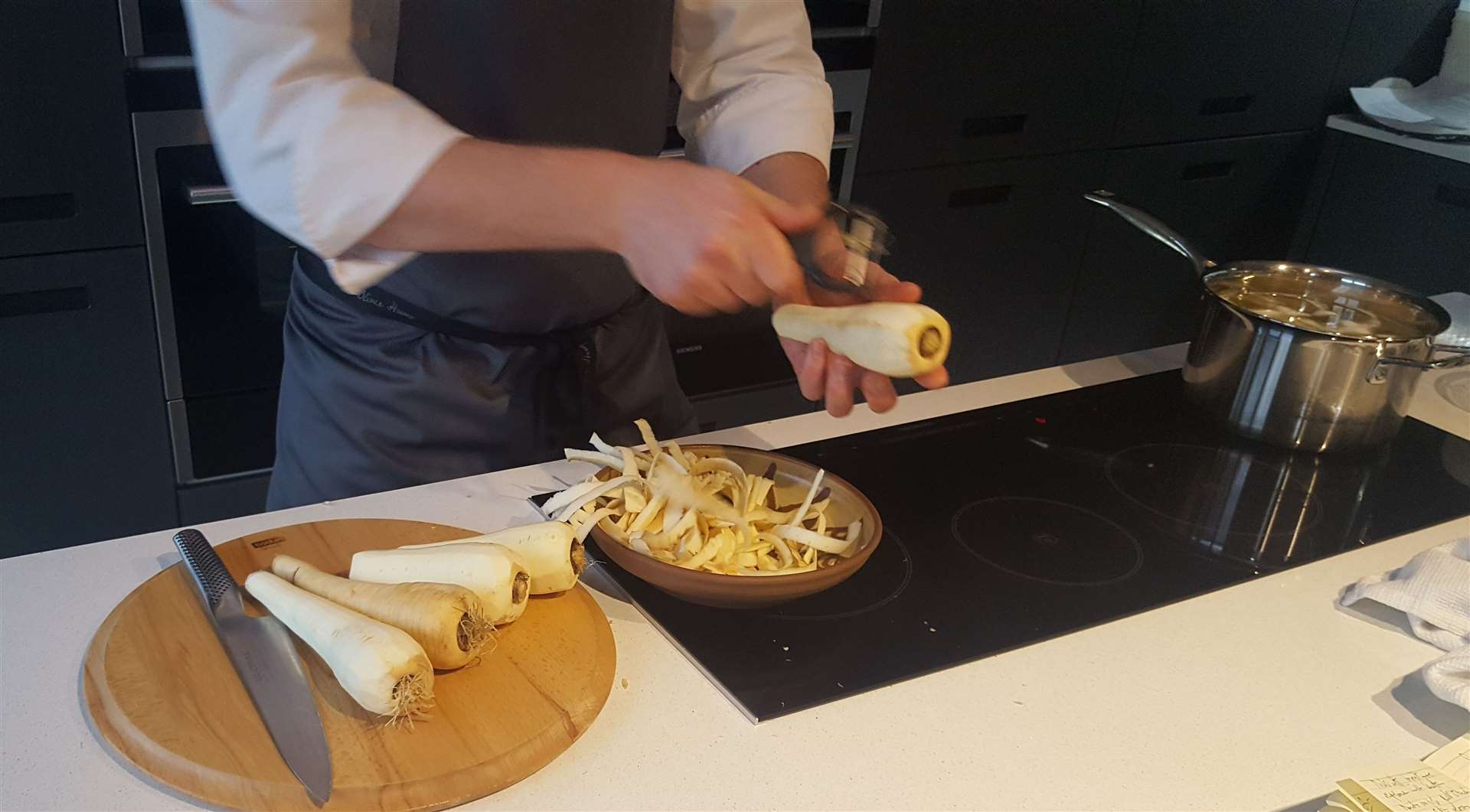 Preparing the parsnips, which are roasted for 20 minutes