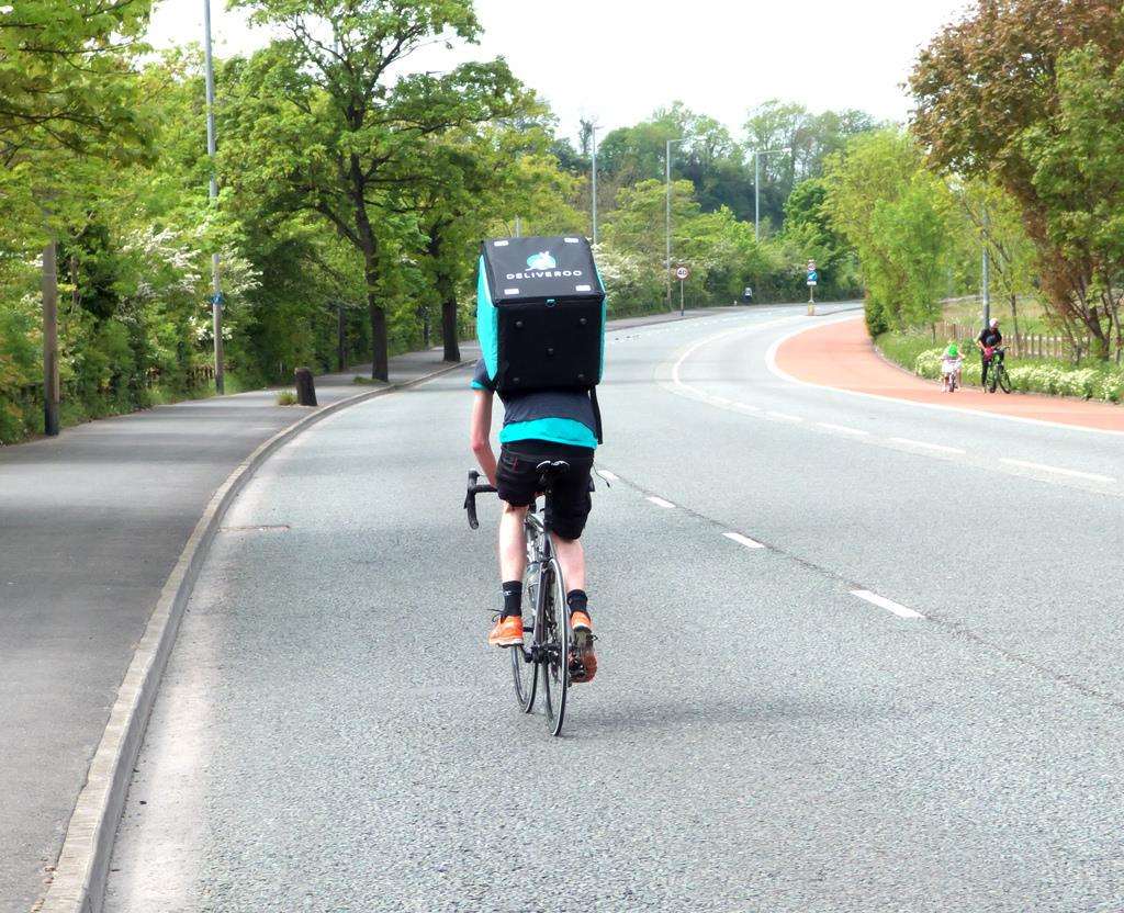A deliveroo cyclist in Canterbury