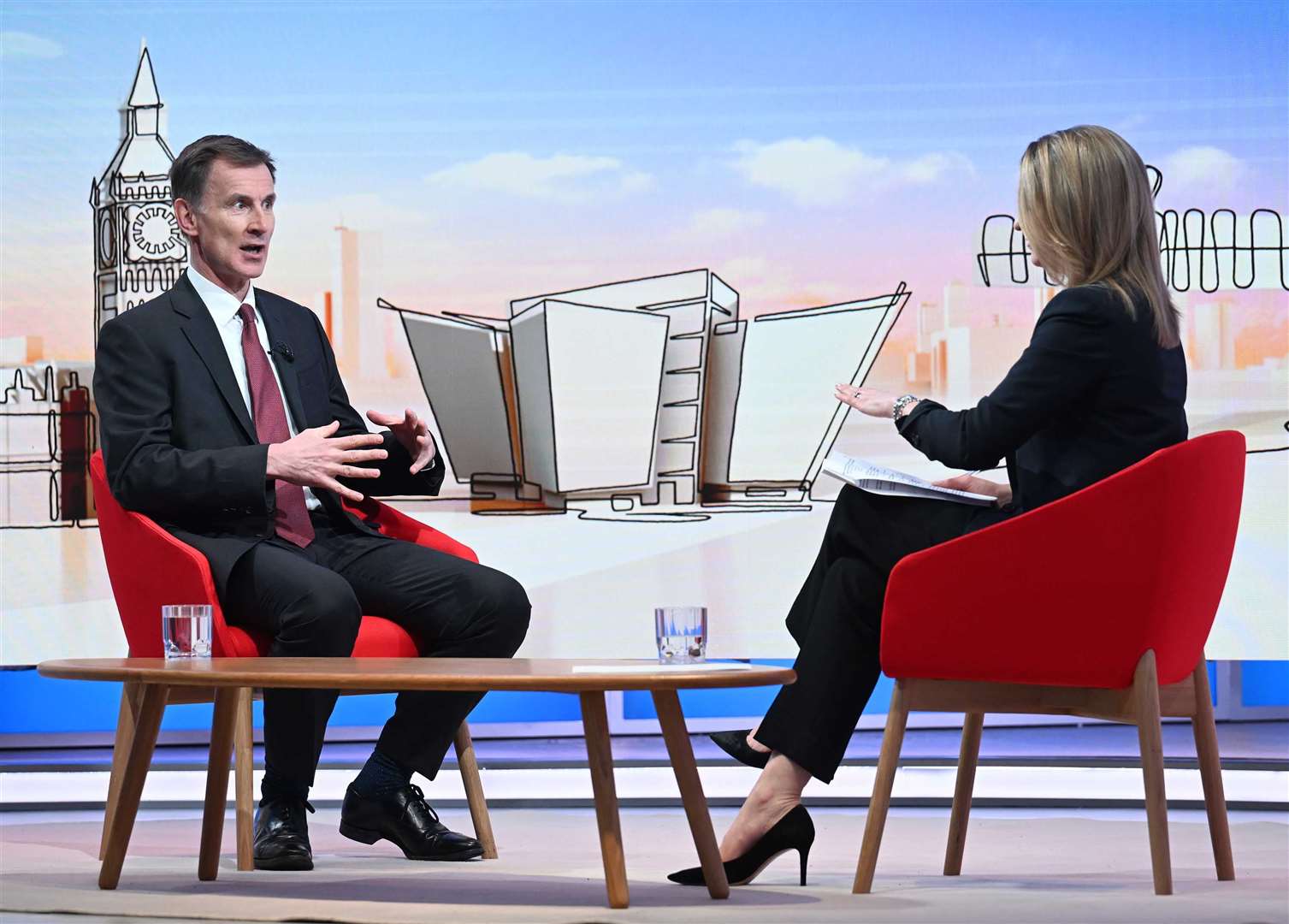 Chancellor Jeremy Hunt with Laura Kuenssberg (BBC/Jeff Overs/PA)