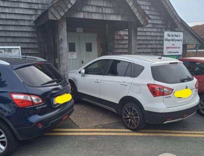 A car parked at an entrance to Wingham Village Hall