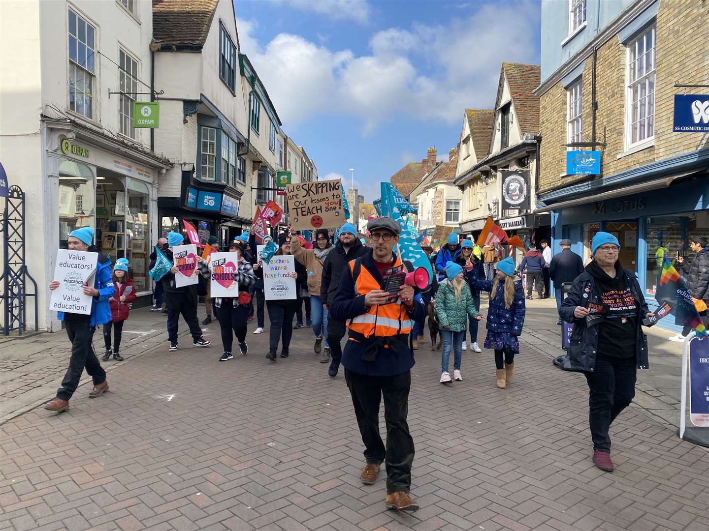 Protesters marching through the centre of Canterbury earlier today