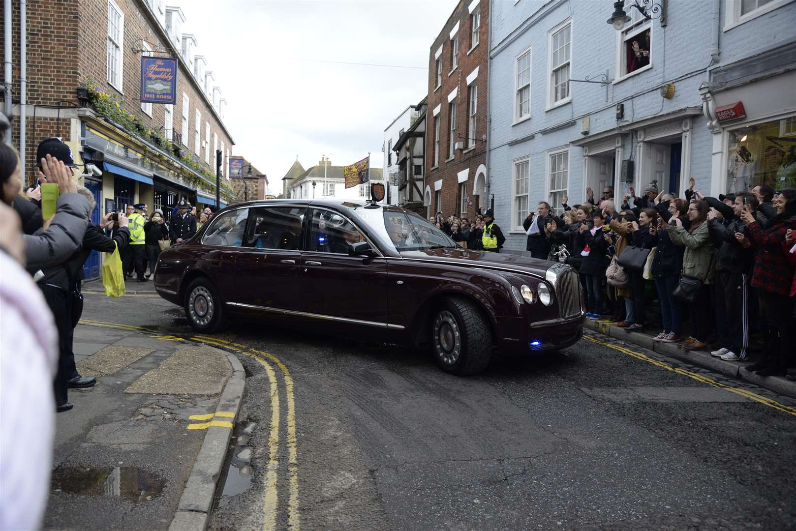 The Queen’s Bentley exiting Cathedral grounds and into Burgate