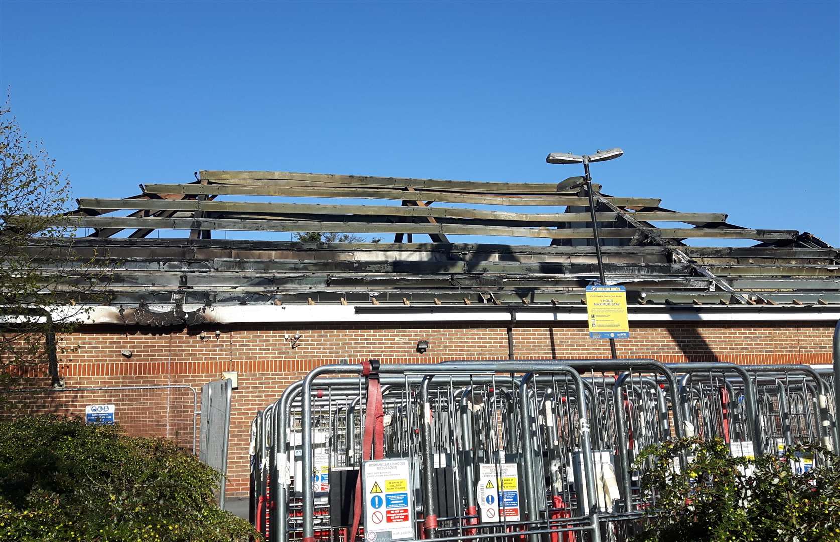 The badly damaged Tesco Express store in Mill Court, Ashford