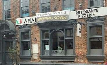 Amalfi in Sittingbourne High Street, with a banner for Coban Kitchen opening soon