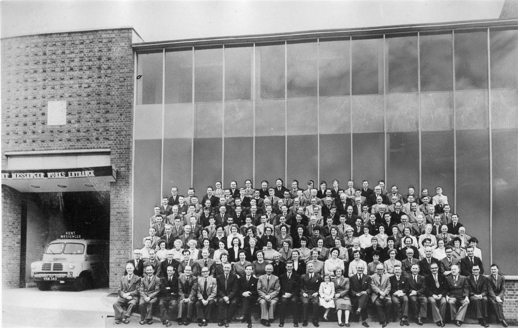 Members of staff of the Kent Messenger Group outside its new premises in Station Road, Maidstone, in 1958