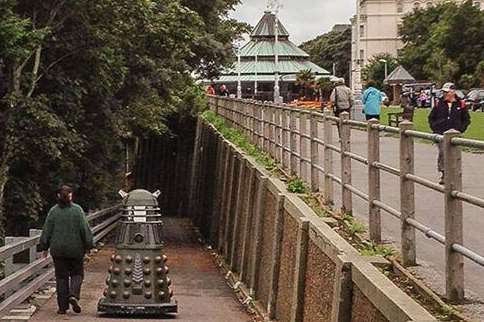 A woman takes a stroll with a Dalek in Folkestone. Picture: @Kent_999s