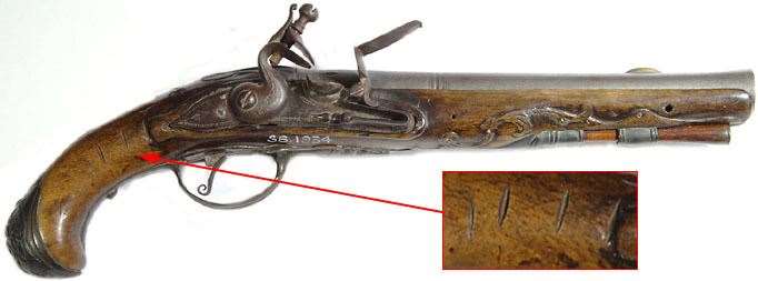 A pistol abandoned by the Hawkhurst Gang at The Battle of Goudhurst, now in Maidstone Museum. The notches may represent the number of people it had killed