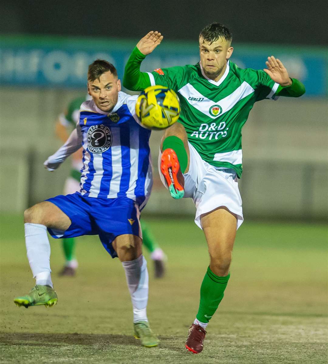 Ashford midfielder Henry Muggeridge in the thick of things against VCD. Picture: Ian Scammell