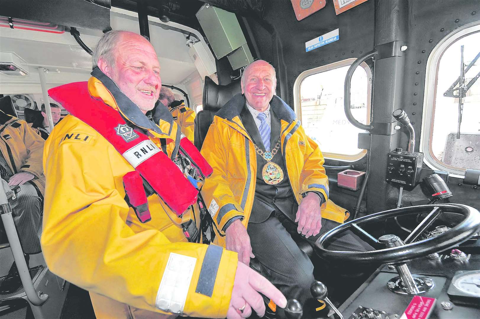 All at sea: Swale mayor Cllr Ben Stokes learns about the Sheerness lifeboat from Coxswain Robin Castle