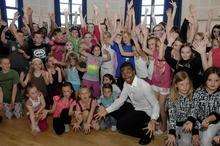 BB aka Marquelle Ward from Britannia High and young admirers at the opening of DanceDomain at Herne Bay Junior School on Friday
