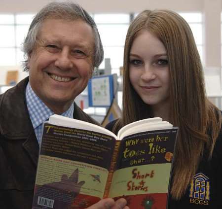 Author Stewart Ross presents Rumour Giles with a copy of the book her story appears in