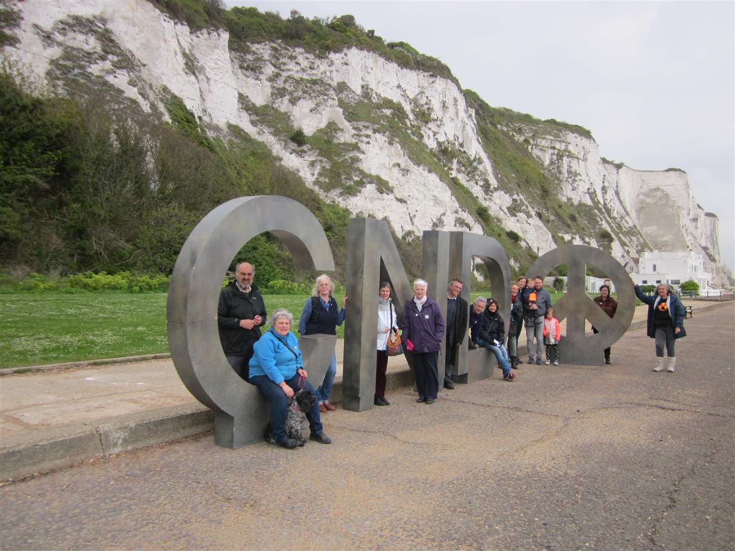 The CND symbol at St Margaret's Bay with local people. Picture supplied by Pam Brivio. (1670660)