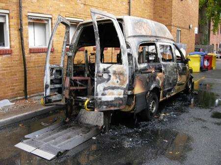 The burnt-out van outside Horsman's Place surgery, in Instone Road