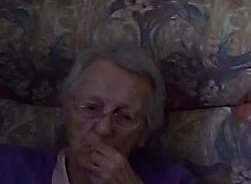 This picture appears to show Eileen Berry taking a tablet out of her mouth after a carer has left the room