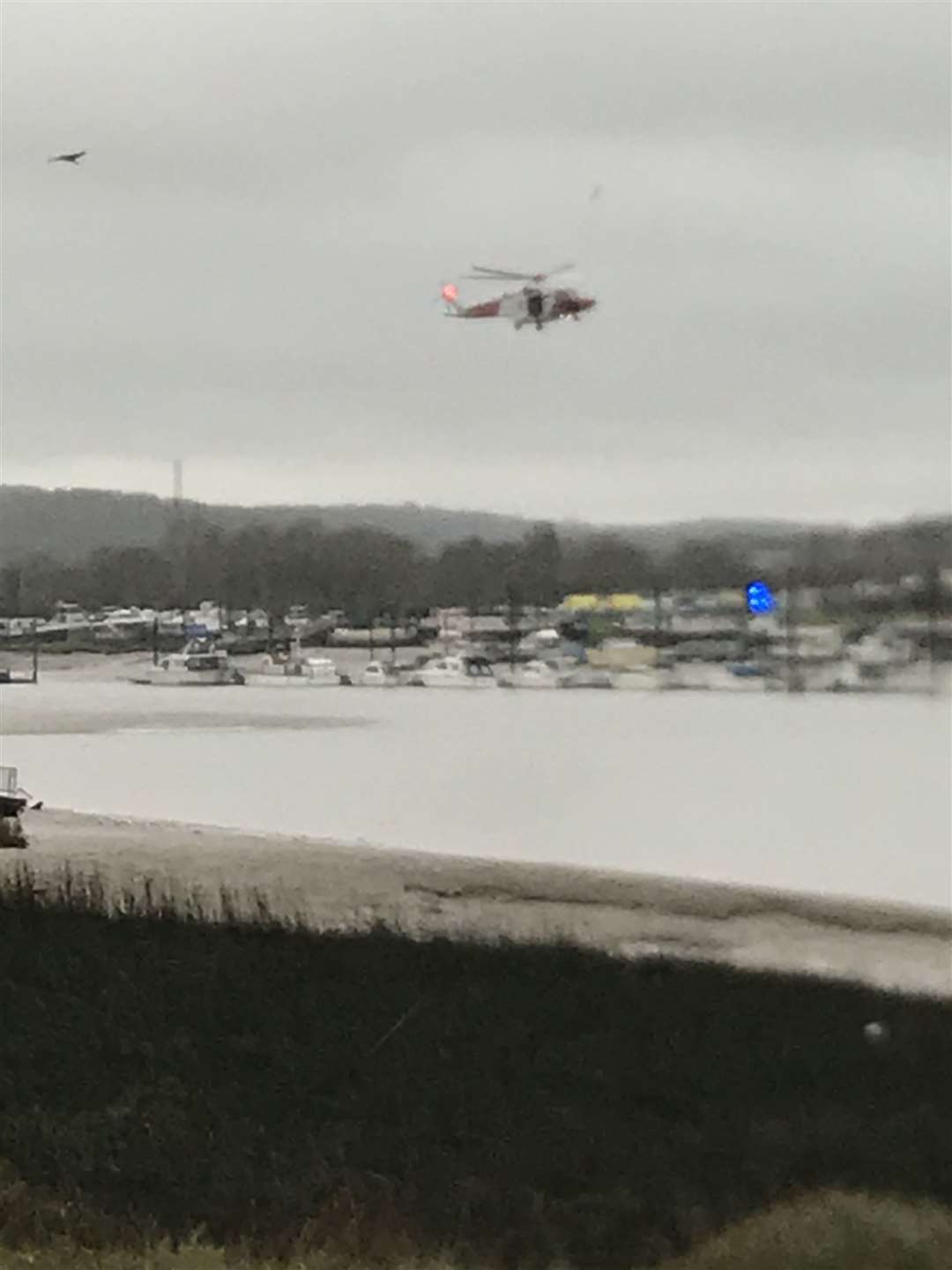 The coastguard helicopter and emergency teams have been called to the area near the M2 bridge and have been spotted searching at Cuxton Marina