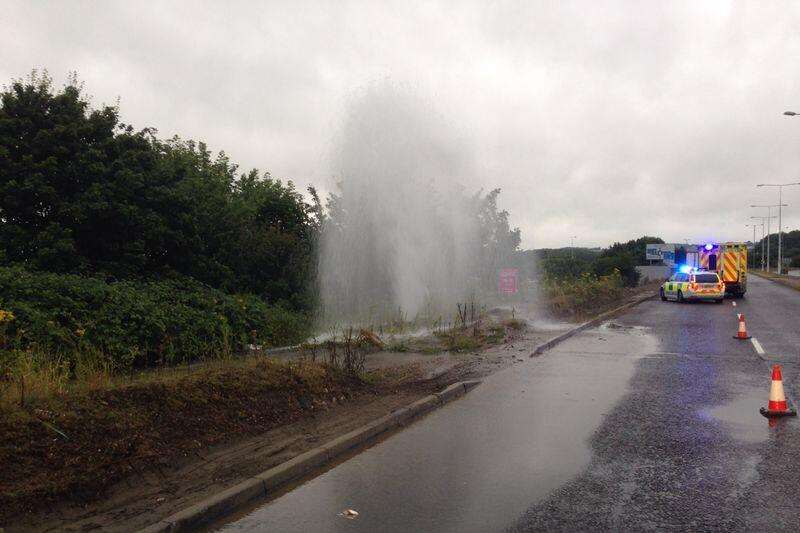 A car struck a fire hydrant sending a jet of water into the sky. Picture: Kent Police Roads Policing Unit