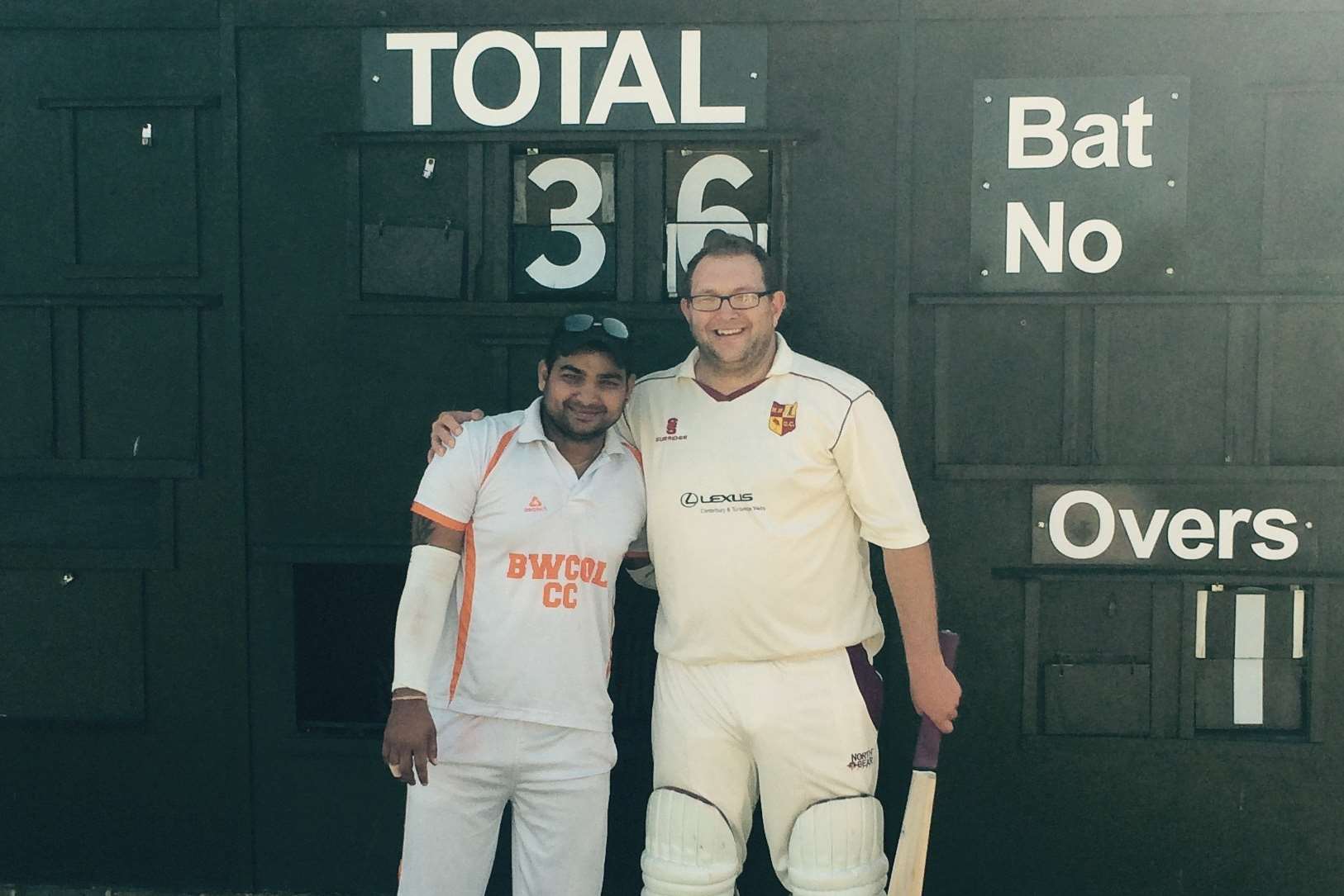 High Halstow big hitter Paul Belsey with the Blackheath Wanderers bowler who took the punishment, Mayank Patel