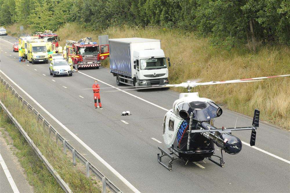 The air ambulance lands on the carriageway