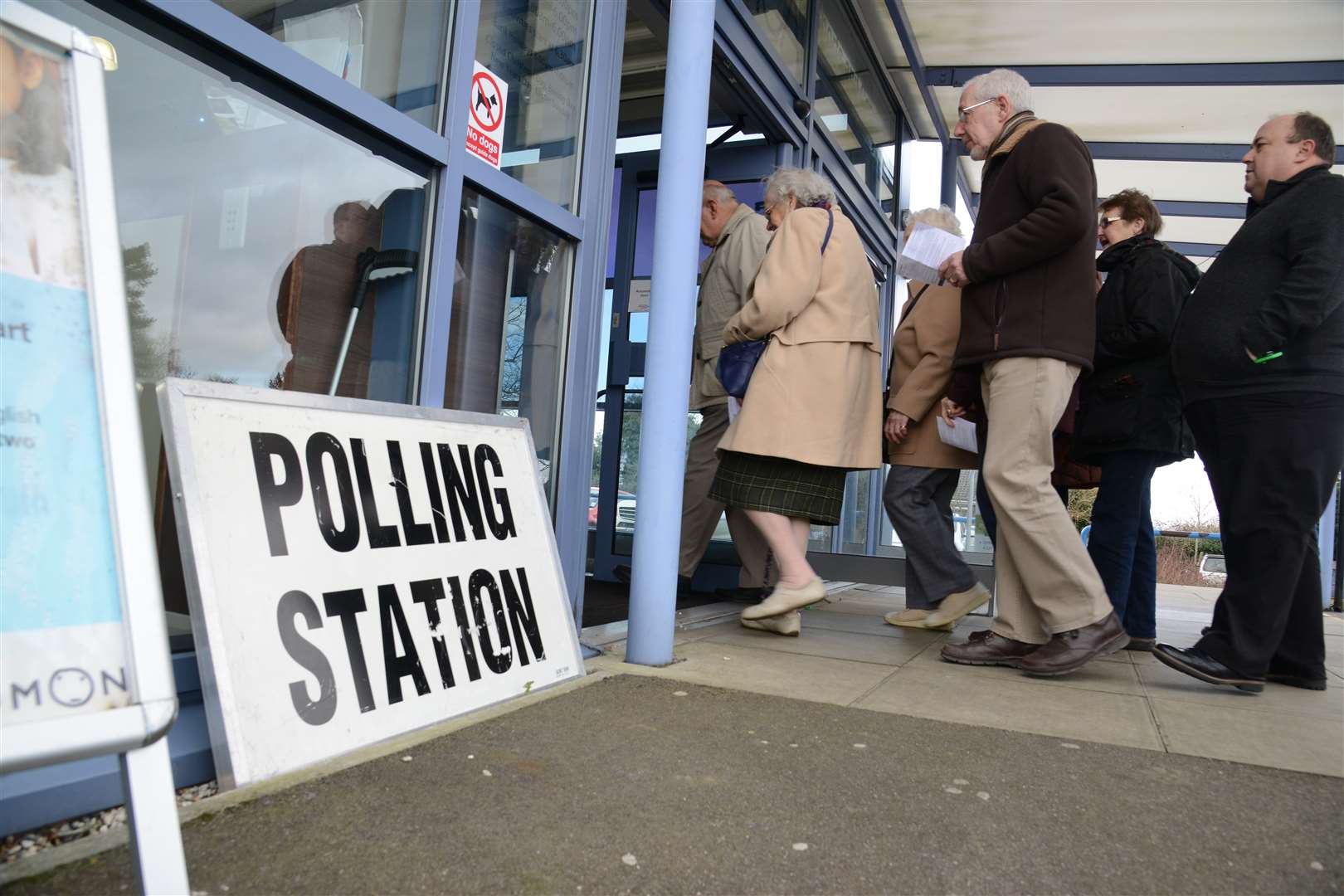 Voters queuing to enter the polling station