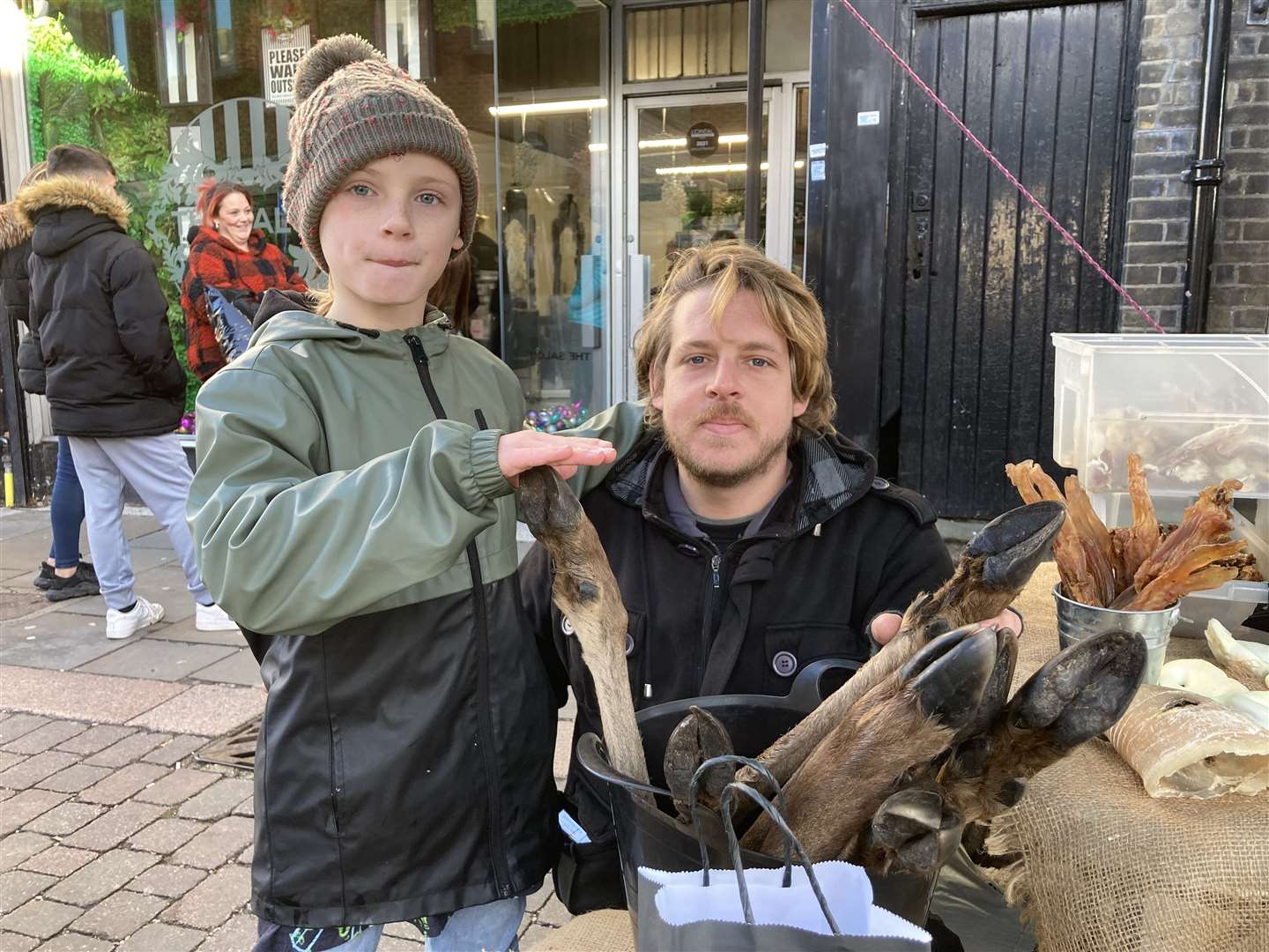 Islander Jake O'Keeffe and his son Oscar, 9, did a roaring trade selling 'reindeer legs' and pig snouts on their natural dog treat stall in Sheerness