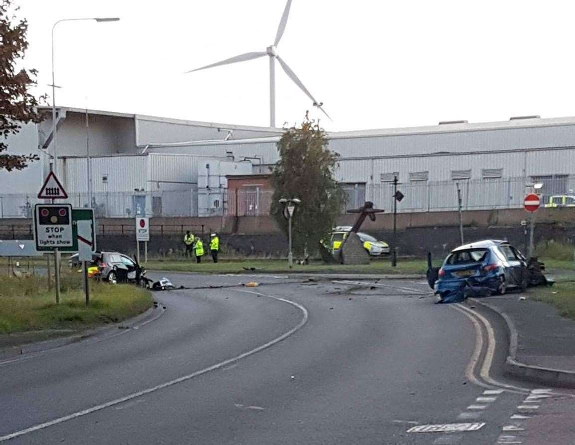 Wreckage scattered across the road after the three-car crash on Brielle Way, Sheerness, on Friday, August 18. Picture: Graham McCall