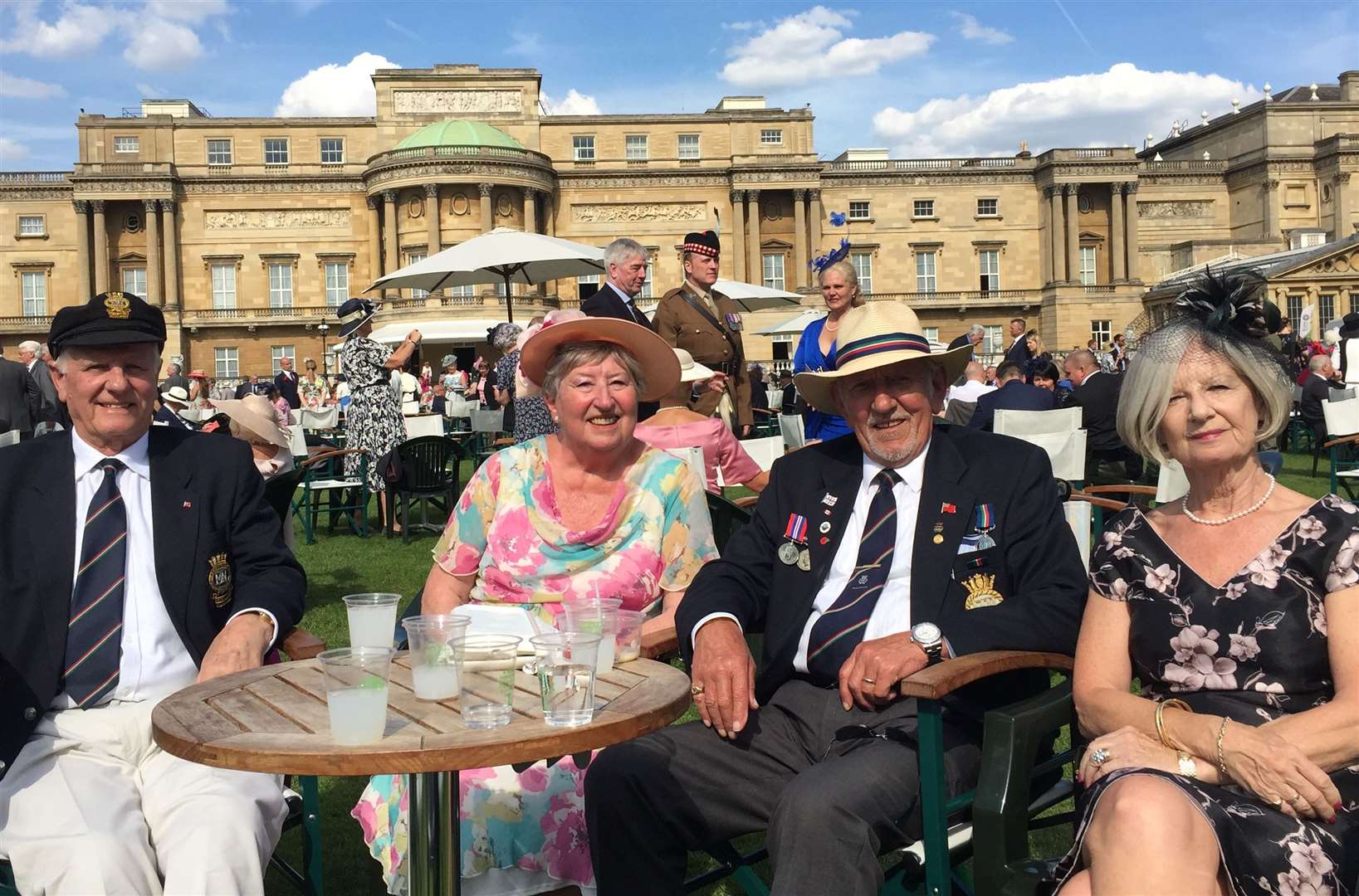 Colin Orsbourn, Doreen Dillon, Patrick Dillon, and Pat Orsbourn, of the Gravesend Merchant Navy at The Not Forgotten Association Garden Party Tea on Thursday May 23 at Buckingham Palace