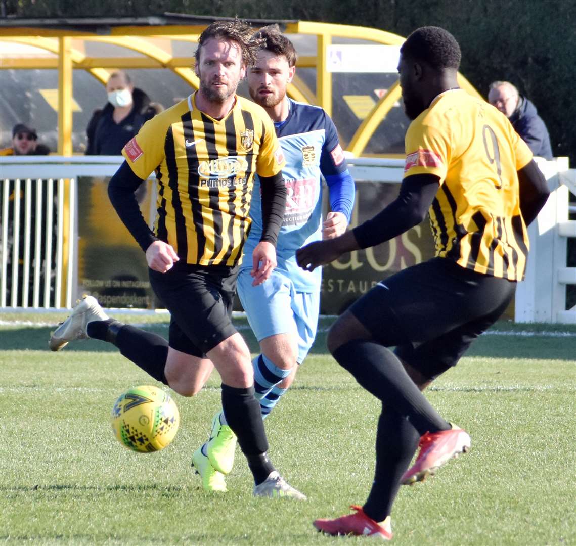 Andy Drury in the thick of it for Folkestone against Cheshunt on Saturday before he left the club for Whitstable. Picture: Randolph File