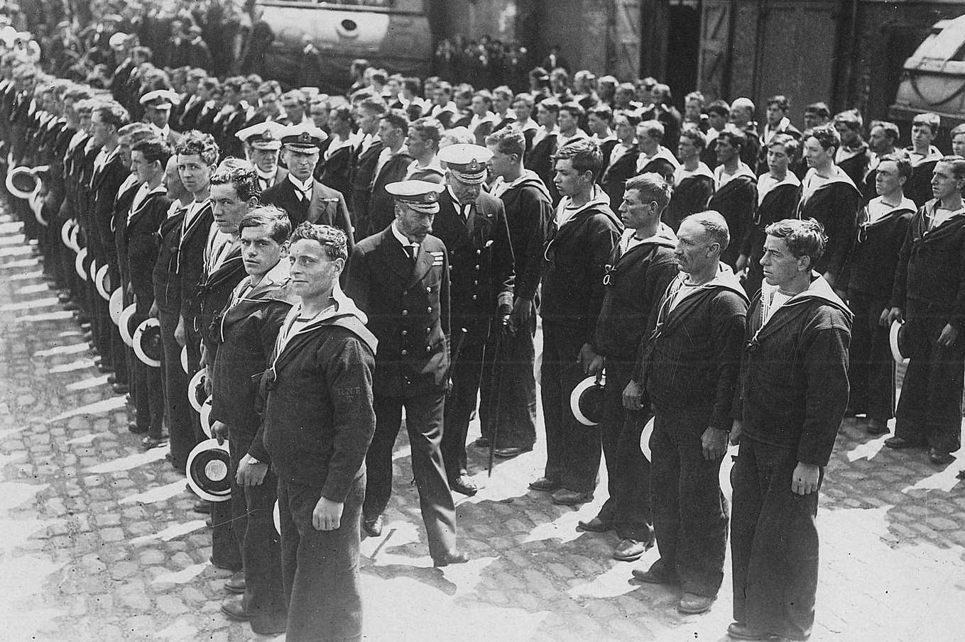 King George V inspecting Royal Navy ratings at the barracks of HMS Pembroke during his 1918 visit to Chatham