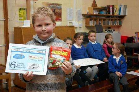 Joseph Fowler, nine, won first prize of 6 months gym and spa membership for his mum