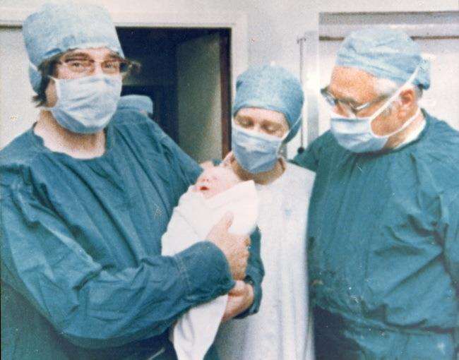 Patrick Steptoe (left) and Robert Edwards with baby Louise Brown