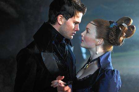 Jeremy Irvine as Pip and Holliday Grainger as Estella in Great Expectations