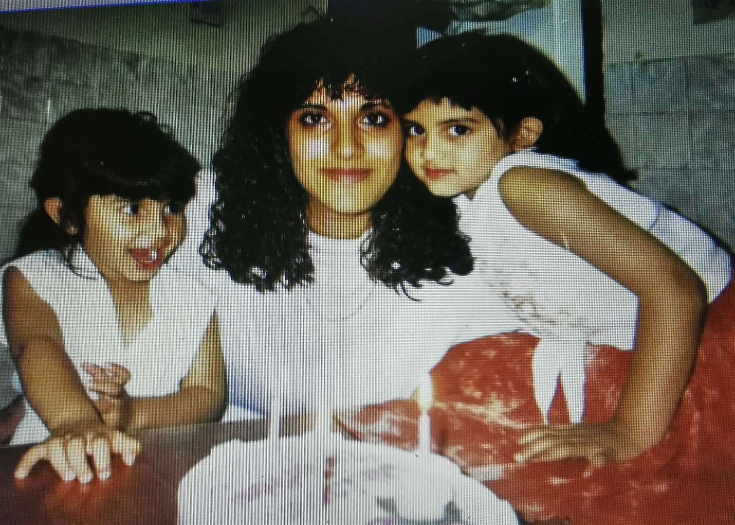 Stella, with daughters Anisha and Farah in 1995