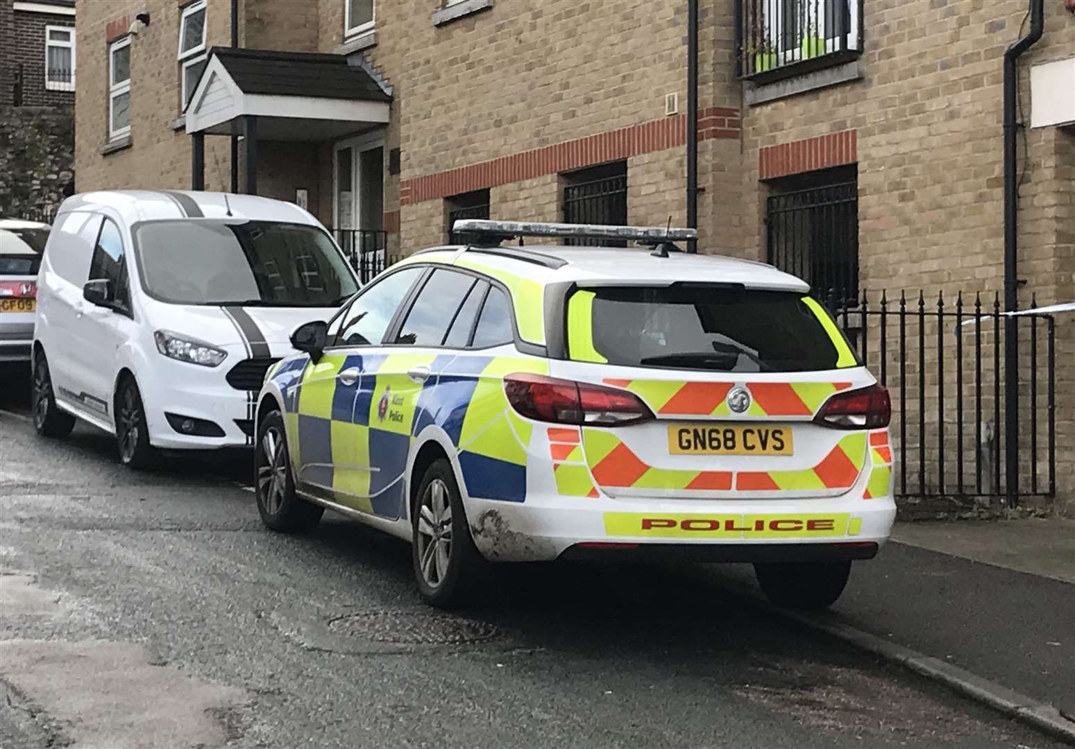 Police cars were seen at the scene in Rochester when the body was discovered in October