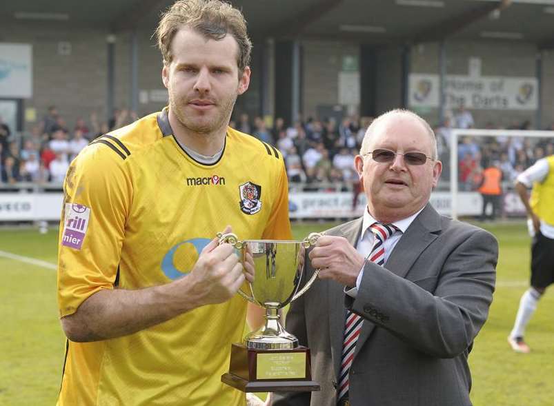 Alan Julian collects his player-of-the-year trophy from Dartford Supporters Association chairman Ken Humphrey