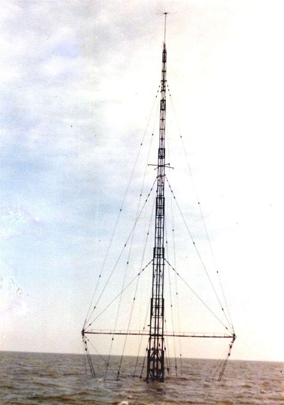 All that remained visible above the waves of Radio Caroline's Mi Amigo was the mast