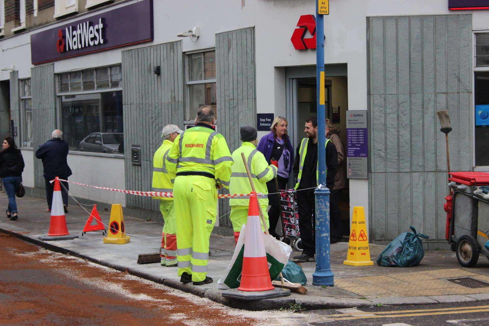 Workers cleaned up the pavement after Susan Bidgood slipped on oil in Sheerness High Street