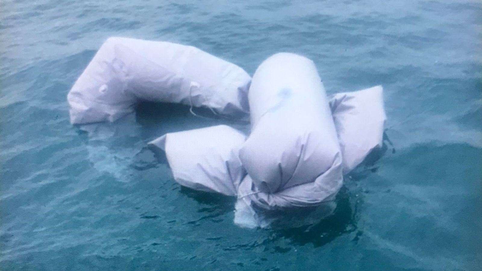 The sunk dinghy off Calais. At least 28 died when it capsized Picture: Local lifeboat crew